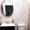 Powder Room Design Featuring Calacatta Gold Vagli Marble by Med Tile